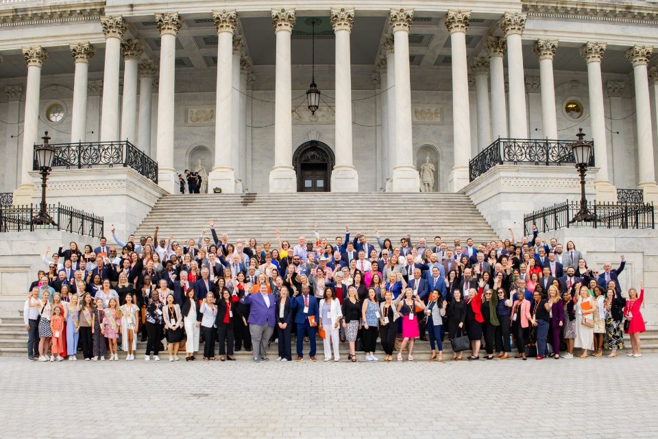 National Council members stand in front of the Capitol in DC